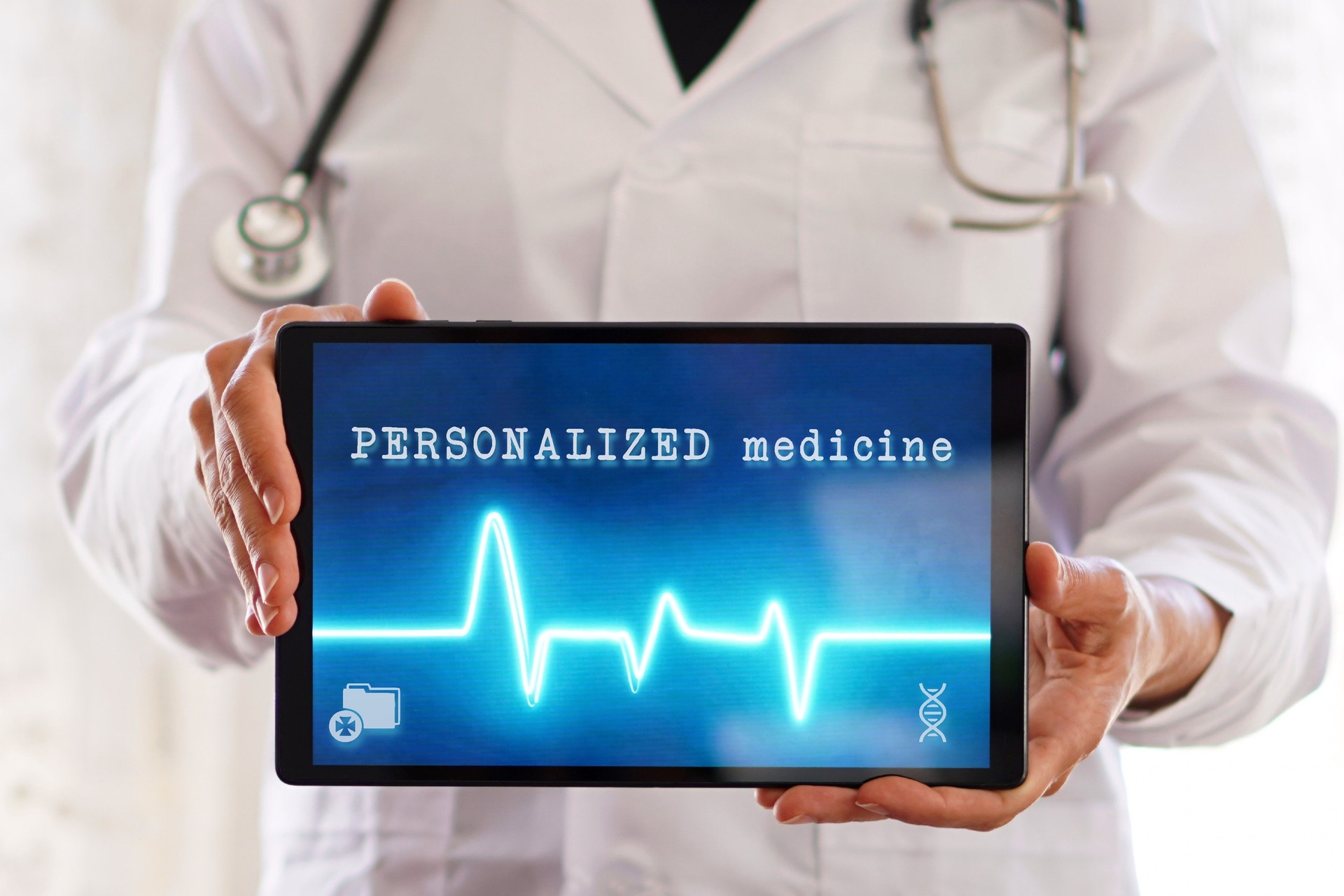 personalized medicine concept. woman doctor showing a tablet with medical app